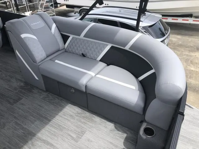 Slide: The Image of Underneath view of 2025 Crest Classic LX 220 SLRC pontoon boat, showcasing metal structure. - 21