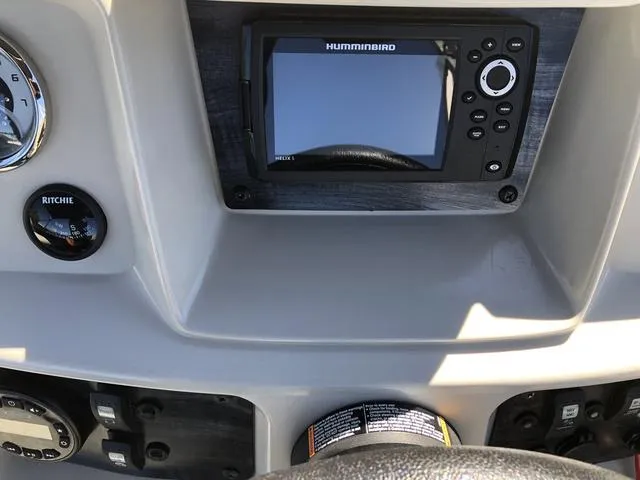 Slide: The Image of Dashboard of 2022 SunChaser Vista 188 Sport Fish with Humminbird fish finder. - 15