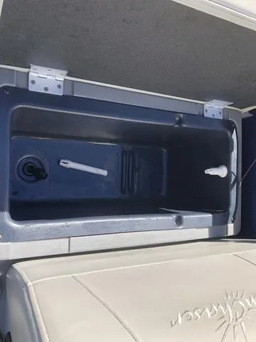 Slide: The Image of Livewell compartment in 2022 SunChaser Vista 188 Sport Fish boat. - 23