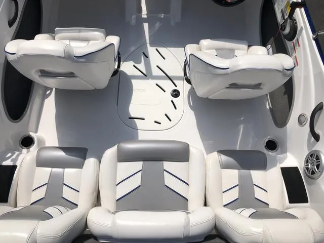 Slide: The Image of 2021 Nitro Z19 Sport boat interior with white and gray seating arrangement. - 22