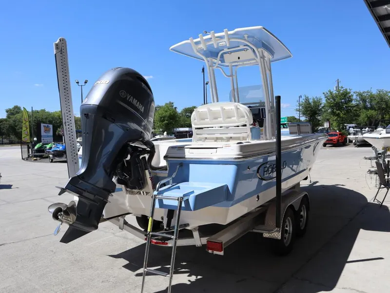 Slide: The Image of 2023 Robalo 226 Cayman boat with Yamaha engine on trailer, outdoor display. - 4