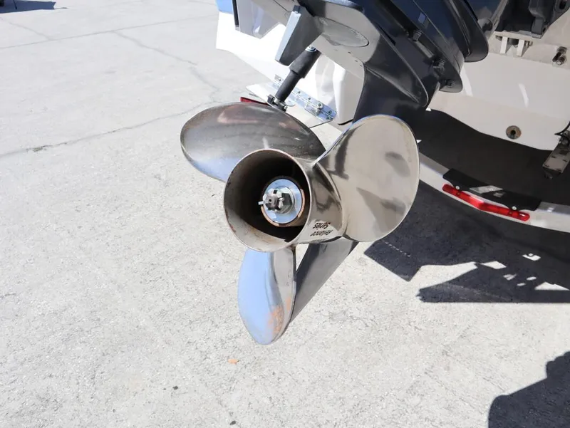 Slide: The Image of Propeller of 2023 Robalo 226 Cayman boat on concrete surface. - 8