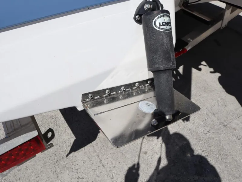 Slide: The Image of 2023 Robalo 226 Cayman boat with Lenco trim tab system. - 9