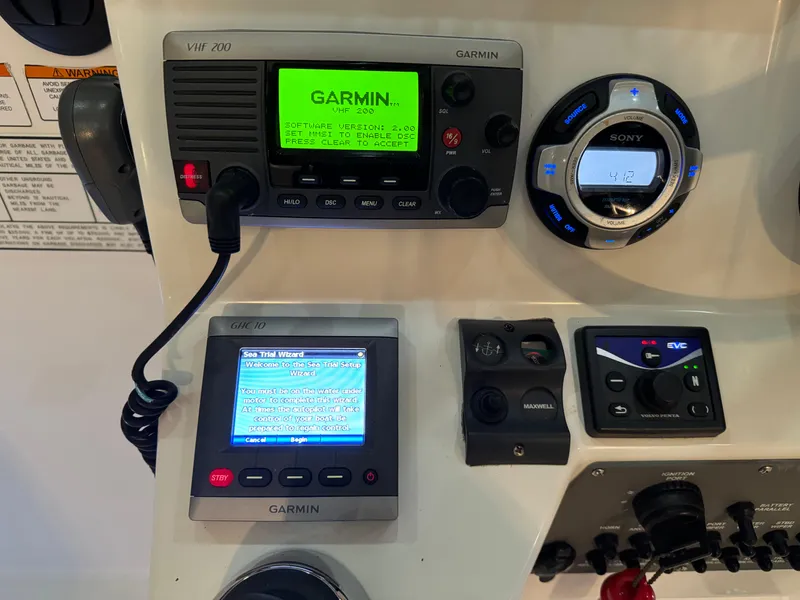 Slide: The Image of Control panel of a 2011 Rampage 34 IPS boat with Garmin and Sony electronics. - 28