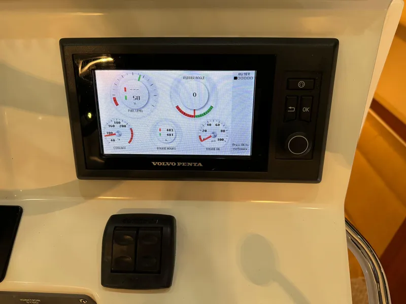 Slide: The Image of Volvo Penta display on 2011 Rampage 34 IPS boat dashboard showing engine metrics. - 29