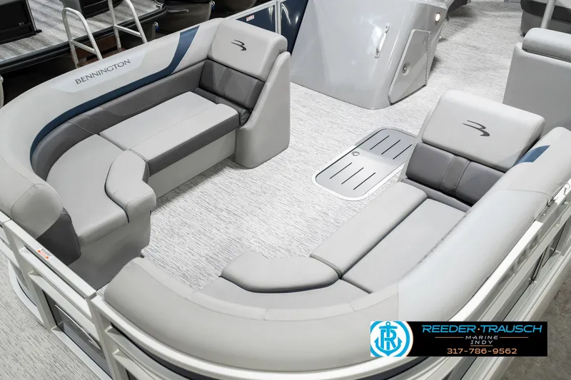 Slide: The Image of 2025 Bennington 23 S Cruise pontoon boat interior with gray seating and modern design. - 12