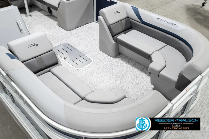Slide: The Image of 2025 Bennington 23 S Cruise pontoon boat interior with plush seating and modern design. - 13