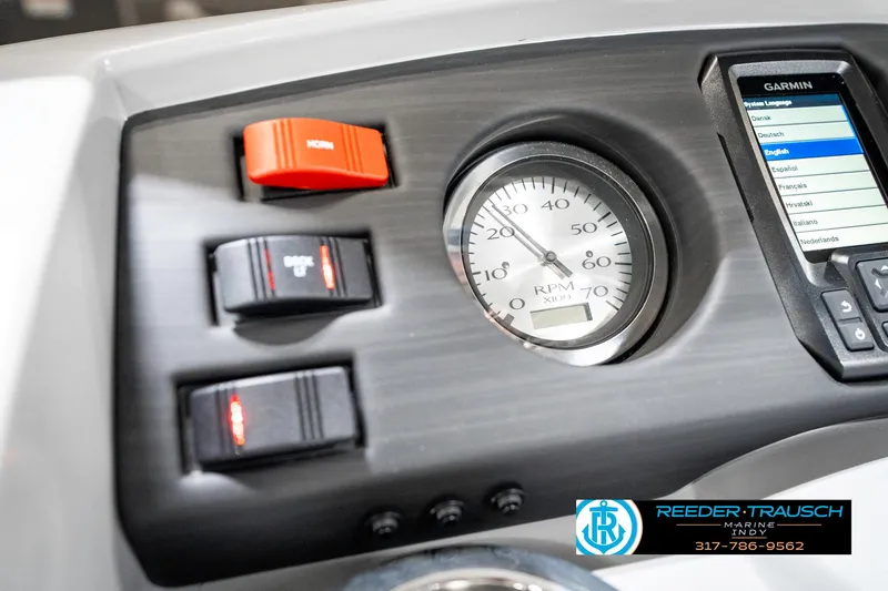 Slide: The Image of Dashboard of 2025 Bennington 23 S Cruise with speedometer and Garmin display. - 36