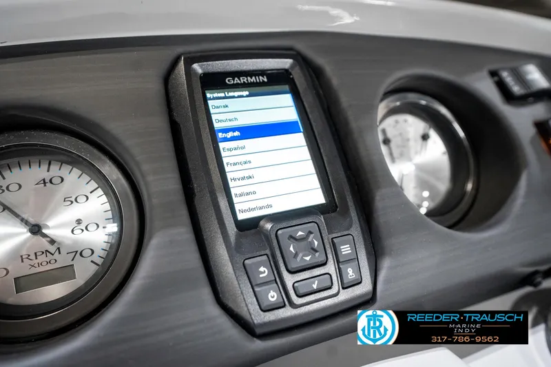 Slide: The Image of Dashboard of 2025 Bennington 23 S Cruise with Garmin display and RPM gauge. - 37