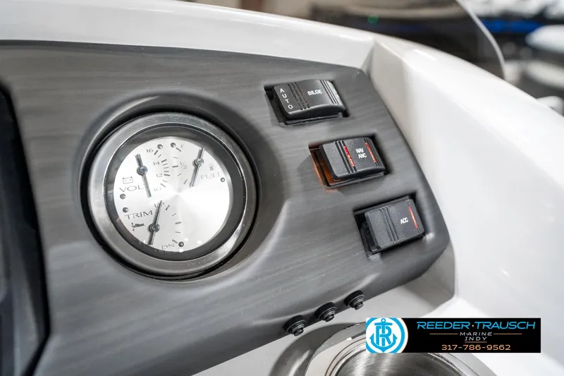 Slide: The Image of Dashboard of 2025 Bennington 23 S Cruise boat with gauges and switches. - 38