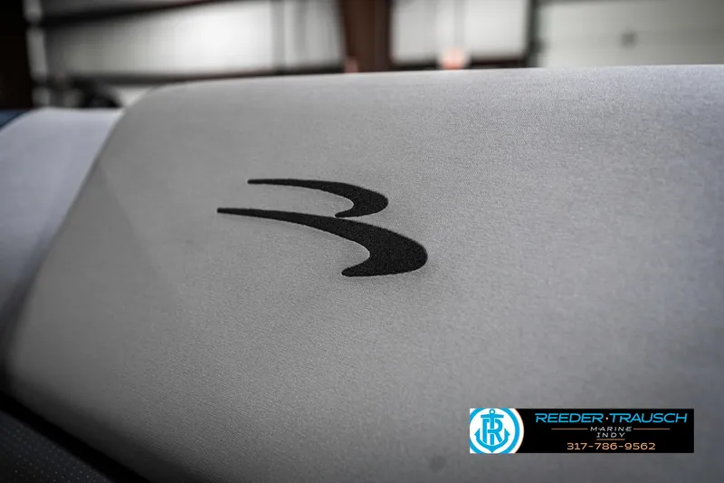 Slide: The Image of 2025 Bennington 23 S CRUISE boat seat with logo, showcased by Reeder-Trausch Marine. - 43