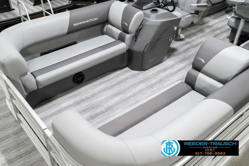 Slide: The Image of 2025 Bennington 21 SS pontoon boat interior with gray seating and modern design. - 12