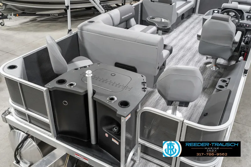 Slide: The Image of 2025 Bennington 21 SS pontoon boat interior with gray seating and helm. - 14