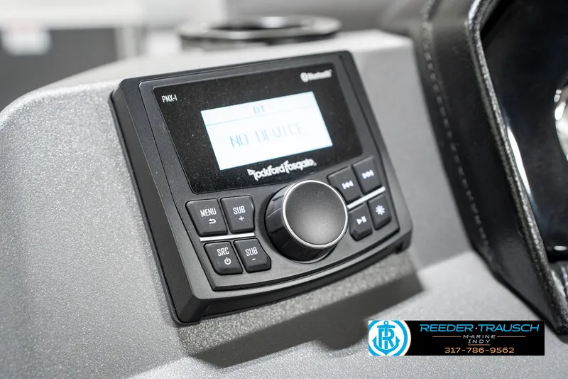 Slide: The Image of 2025 Bennington 21 SS boat dashboard with Rockford Fosgate audio system. - 38