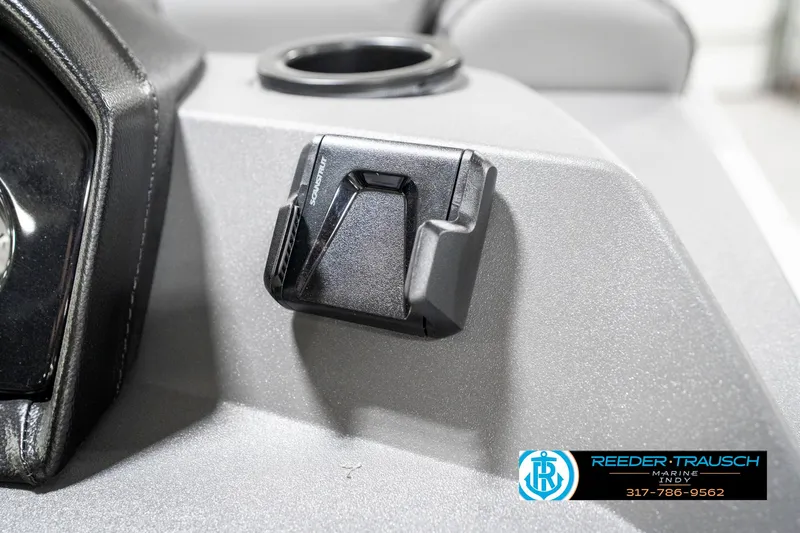 Slide: The Image of 2025 Bennington 21 SS boat dashboard with cup holder and accessory mount. - 40