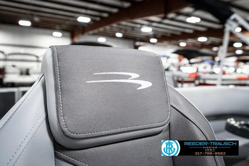 Slide: The Image of 2025 Bennington 21 SS boat seat with logo in showroom setting. - 45