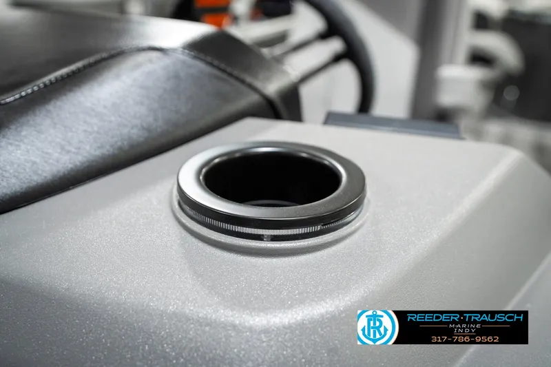 Slide: The Image of 2025 Bennington 21 SS boat cup holder detail with sleek design. - 48