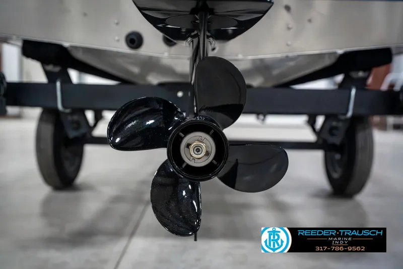 Slide: The Image of Propeller of 2025 Lund 1600 Fury boat on trailer, close-up view. - 40