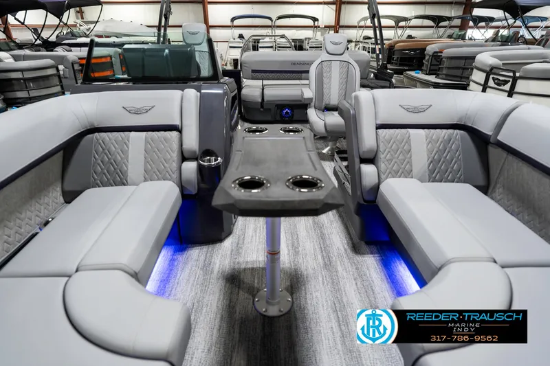 Slide: The Image of 2025 Bennington 22 MSB pontoon boat interior with luxurious seating and ambient lighting. - 15