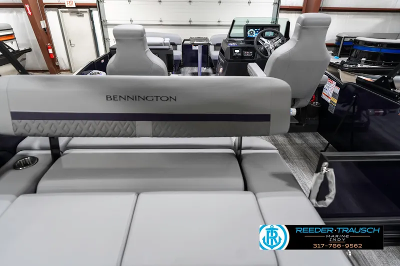 Slide: The Image of 2025 Bennington 22 MSB boat interior with seating and dashboard view. - 18