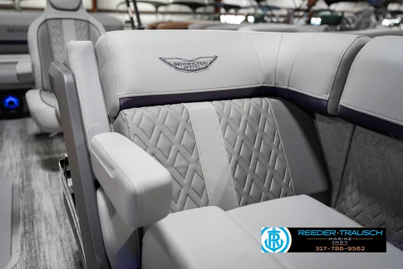 Slide: The Image of Luxurious seating in the 2025 Bennington 22 MSB pontoon boat, featuring elegant diamond stitching. - 24