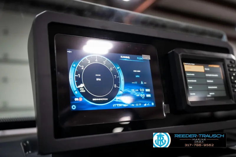 Slide: The Image of Dashboard display of a 2025 Bennington 22 MSB boat, showing RPM and system information. - 42