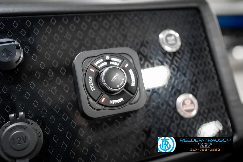 Slide: The Image of Dashboard controls of 2025 Bennington 22 MSB boat with lighting options. - 44