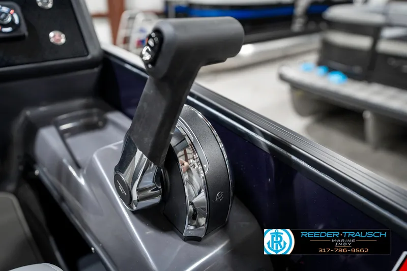 Slide: The Image of Throttle control of 2025 Bennington 22 MSB boat, featuring sleek design and ergonomic handle. - 45
