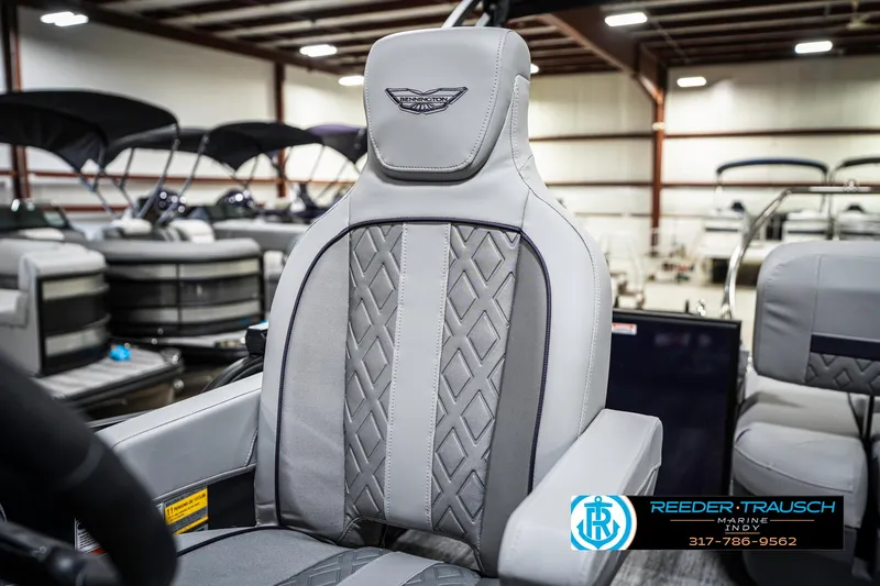 Slide: The Image of 2025 Bennington 22 MSB boat seat with elegant gray upholstery in showroom. - 46