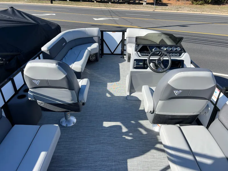 Slide: The Image of 2025 Viaggio Lago V20U boat interior with modern seating and steering console. - 14