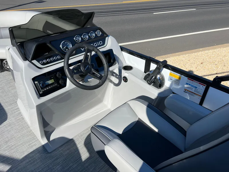 Slide: The Image of Cockpit of 2025 Viaggio Lago V20U boat with steering wheel and control panel. - 15