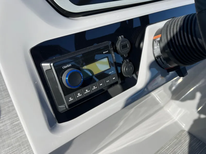 Slide: The Image of Control panel of 2025 Viaggio Lago V20U boat featuring Clarion audio system. - 19