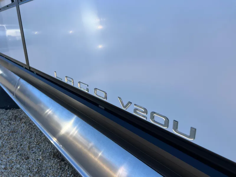 Slide: The Image of 2025 Viaggio Lago V20U boat with sleek metallic lettering on the side. - 4