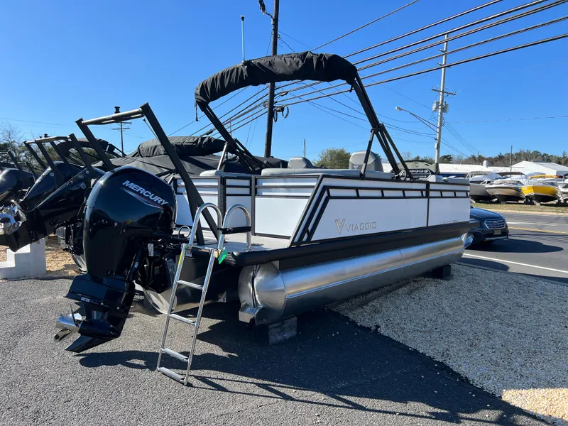 Slide: The Image of 2025 Viaggio Lago V20U pontoon boat with Mercury outboard motor on display. - 6