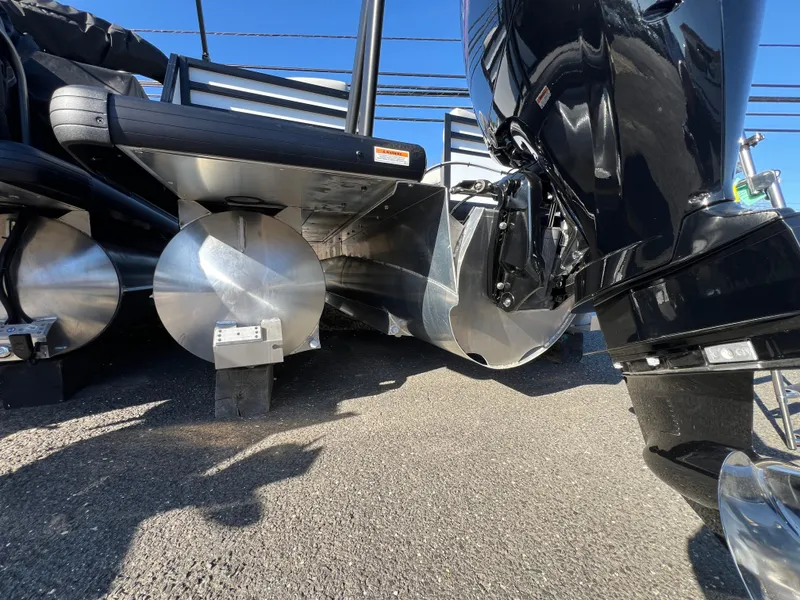 Slide: The Image of 2025 Viaggio Lago V20U pontoon boat undercarriage with shiny metal pontoons. - 8