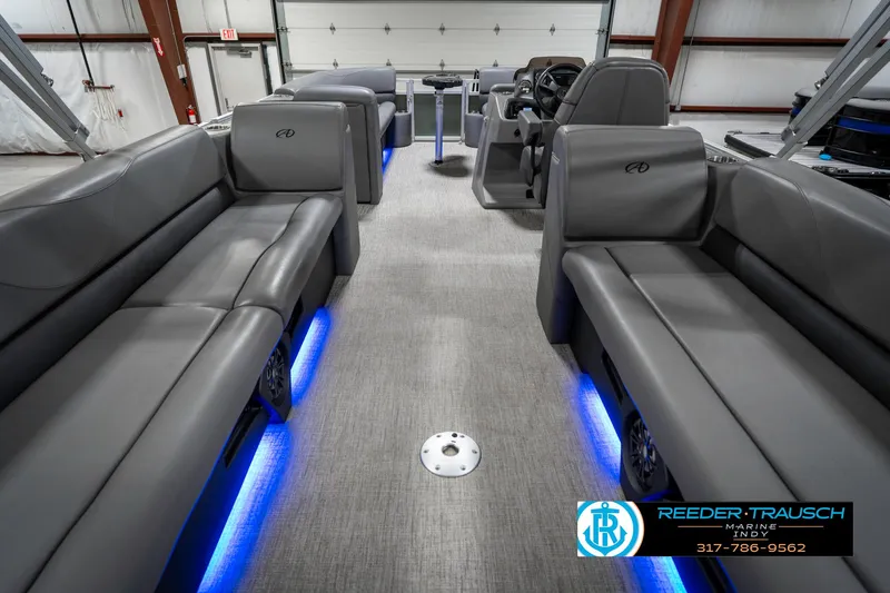 Slide: The Image of 2023 Avalon 2380 VLS interior with gray seating and blue LED lighting. - 19