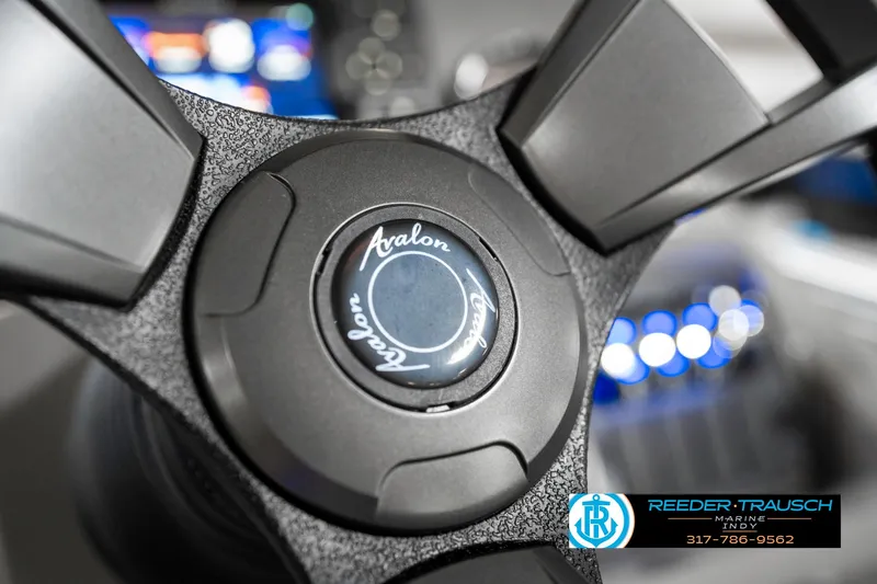 Slide: The Image of Steering wheel of 2023 Avalon 2380 VLS boat with logo detail. - 34