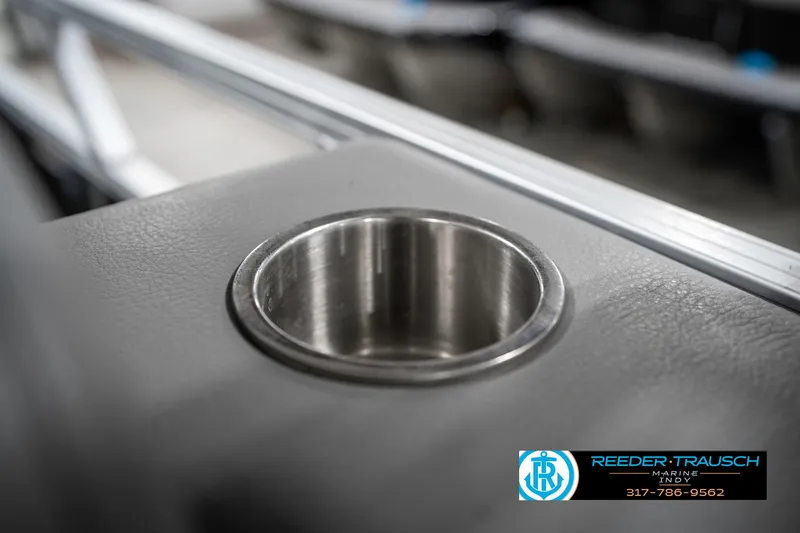 Slide: The Image of Cup holder in 2023 Avalon 2380 VLS boat interior, featuring sleek design and metallic finish. - 48