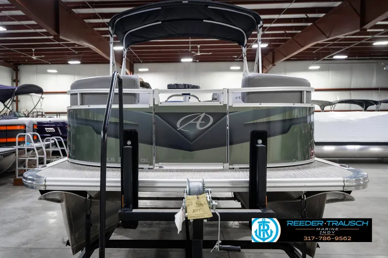 Slide: The Image of 2023 Avalon 2380 VLS pontoon boat displayed in indoor showroom. - 5
