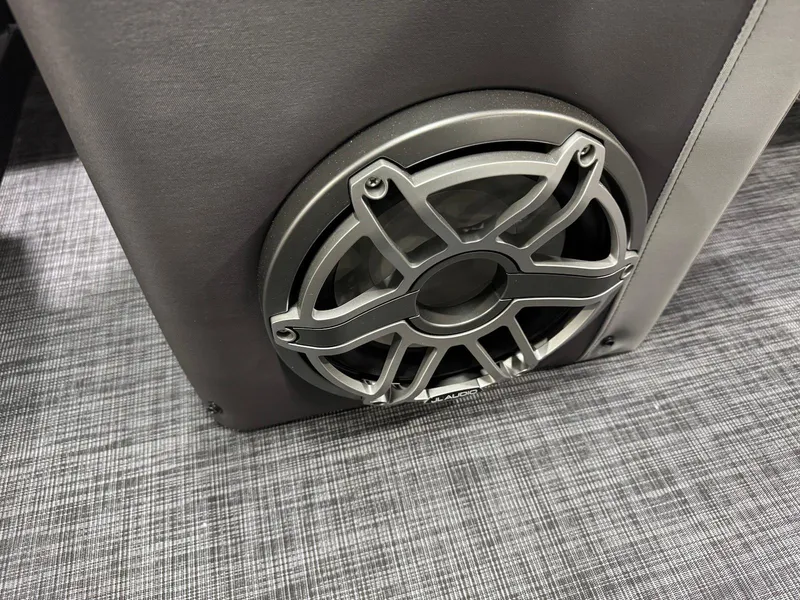 Slide: The Image of Speaker detail on 2025 Godfrey AquaPatio 255 ULC boat, featuring modern design elements. - 11