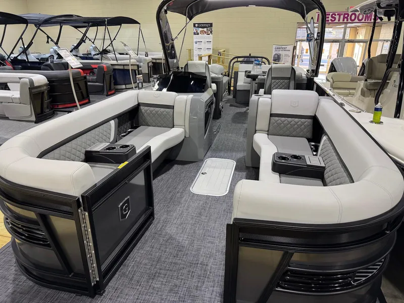 Slide: The Image of 2025 Godfrey AquaPatio 255 ULC pontoon boat with luxurious seating and modern design. - 3