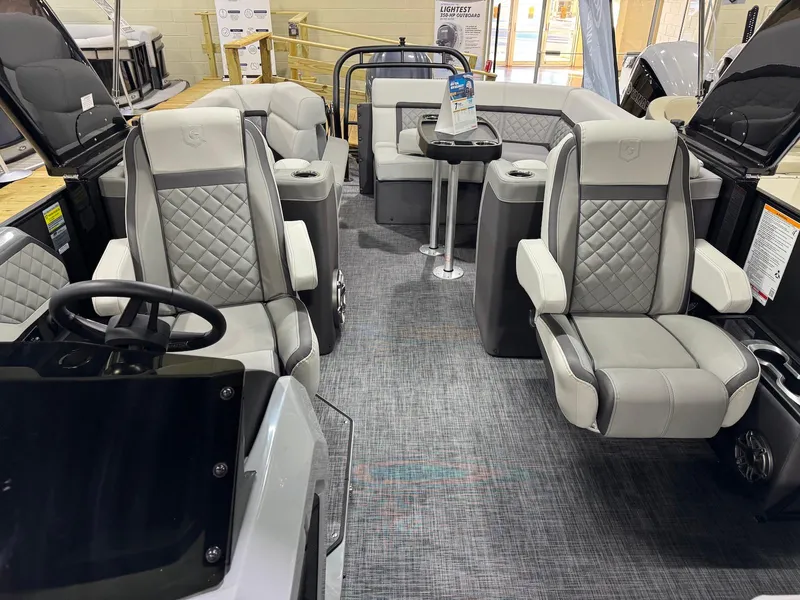 Slide: The Image of Luxurious interior of 2025 Godfrey AquaPatio 255 ULC pontoon boat with plush seating and modern design. - 5