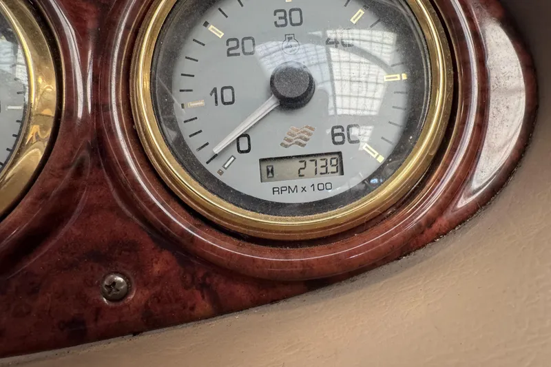 Slide: The Image of Close-up of 2004 Four Winns 210 Horizon tachometer showing 273.9 hours. - 11