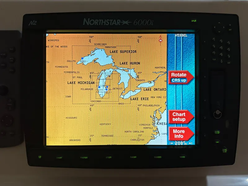 Slide: The Image of Navigation system displaying Great Lakes map on a 2006 Cabo 40 Express boat. - 10