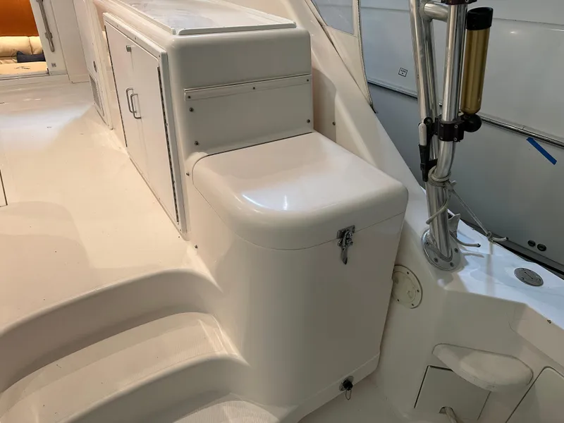 Slide: The Image of 2006 Cabo 40 Express boat interior with storage compartment and steps. - 20
