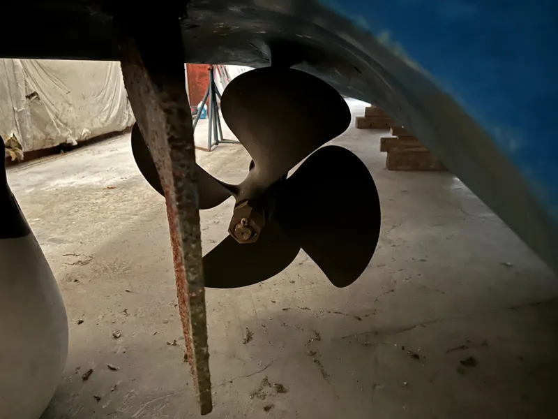 Slide: The Image of Propeller of 2006 Cabo 40 Express boat in a workshop setting. - 41