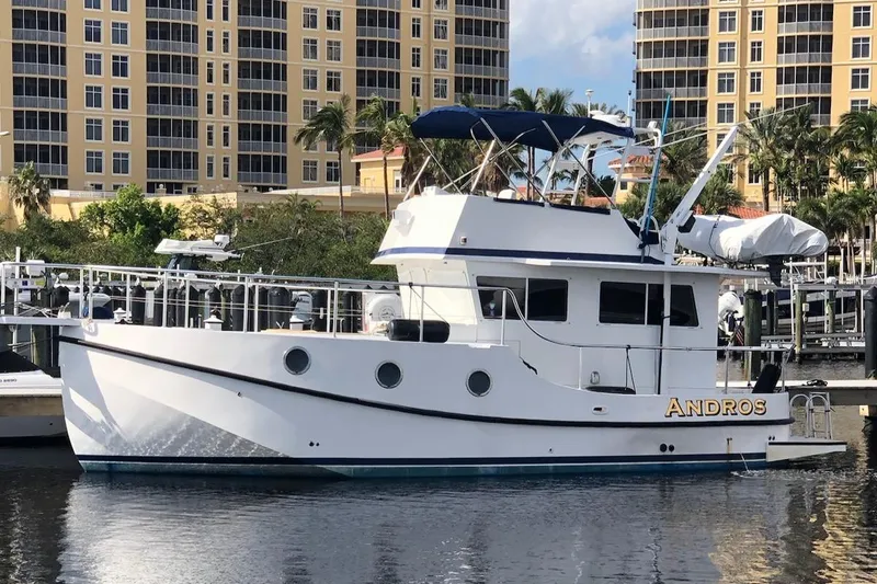 The Image of 2008 Great Harbour N37 yacht docked near waterfront buildings. - 1