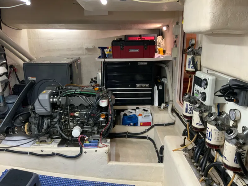 Slide: The Image of Engine room of a 2008 Great Harbour N37 boat with tools and equipment. - 24