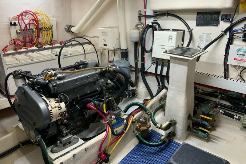 Slide: The Image of Engine room of 2008 Great Harbour N37 boat with wiring and mechanical components. - 26