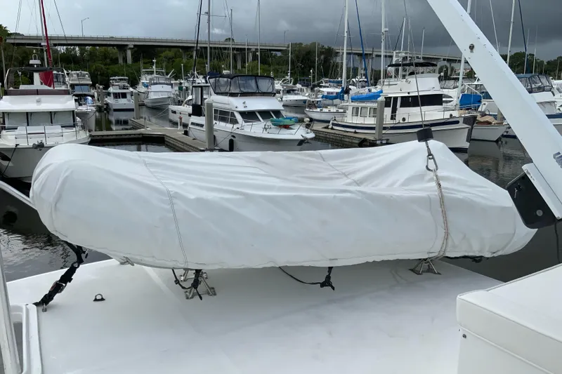 Slide: The Image of Covered boat on Great Harbour N37, 2008 model, docked in a marina. - 28